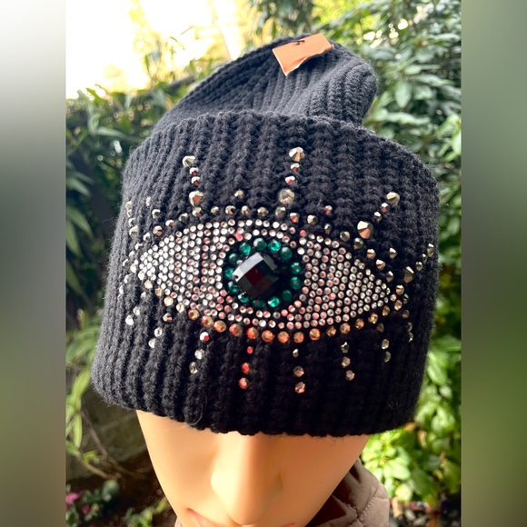 Black Beanie with Eye Design by Kurt Geiger.
NWOT - Picture 5 of 17